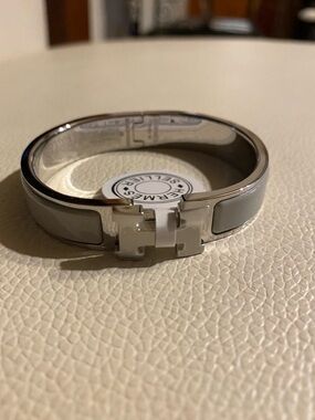 Hermes grey enamel silver bangle bracelet Turn H logo clasp